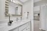 Perfectly located tucked between the main living & guest suite~
