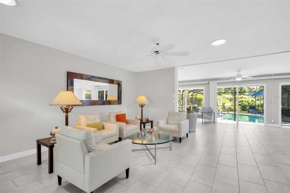 Beautiful 2022 ceramic tile flows seamlessly throughout the main living areas~