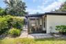 Convenient golf cart garage off the rear of the home~