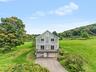 Custom-built in2002, 3.43 acres backing up to equestrian farm.