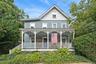 Front of home with beautiful porch with classic Sea Cliff charm