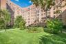 Scarsdale Manor - large open grassy area in the front courtyard of the building