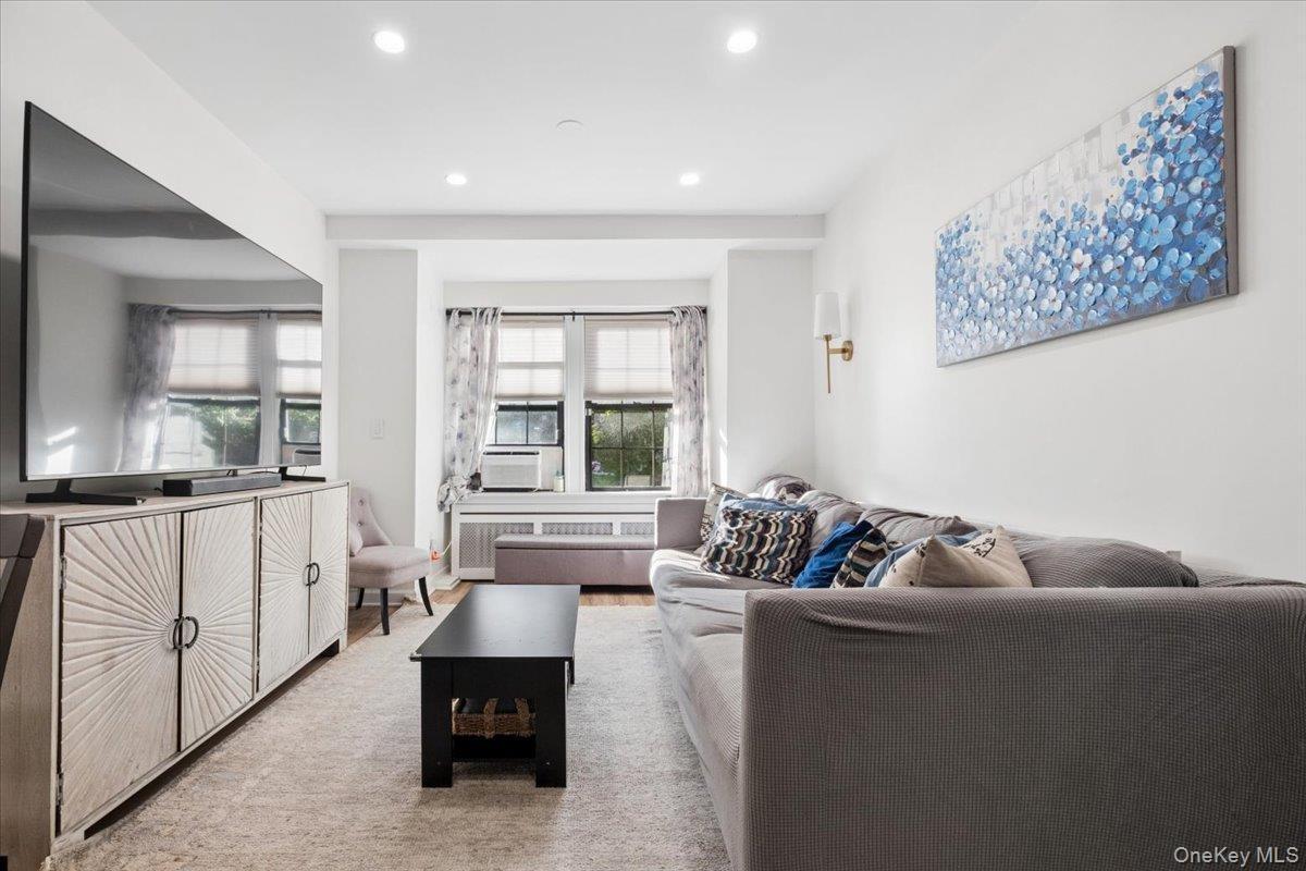 Large living room provides plenty of space for comfortable seating area