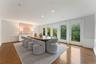 Dining Room with wall of windows overlooking the magnificient grounds