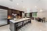 Gourmet kitchen with large center island with seating for 5!