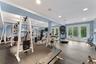 Gym with walkout access to pool