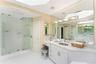 Primary bathroom with large shower and skylight