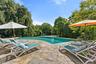 Salt water infinity pool with waterfall feature