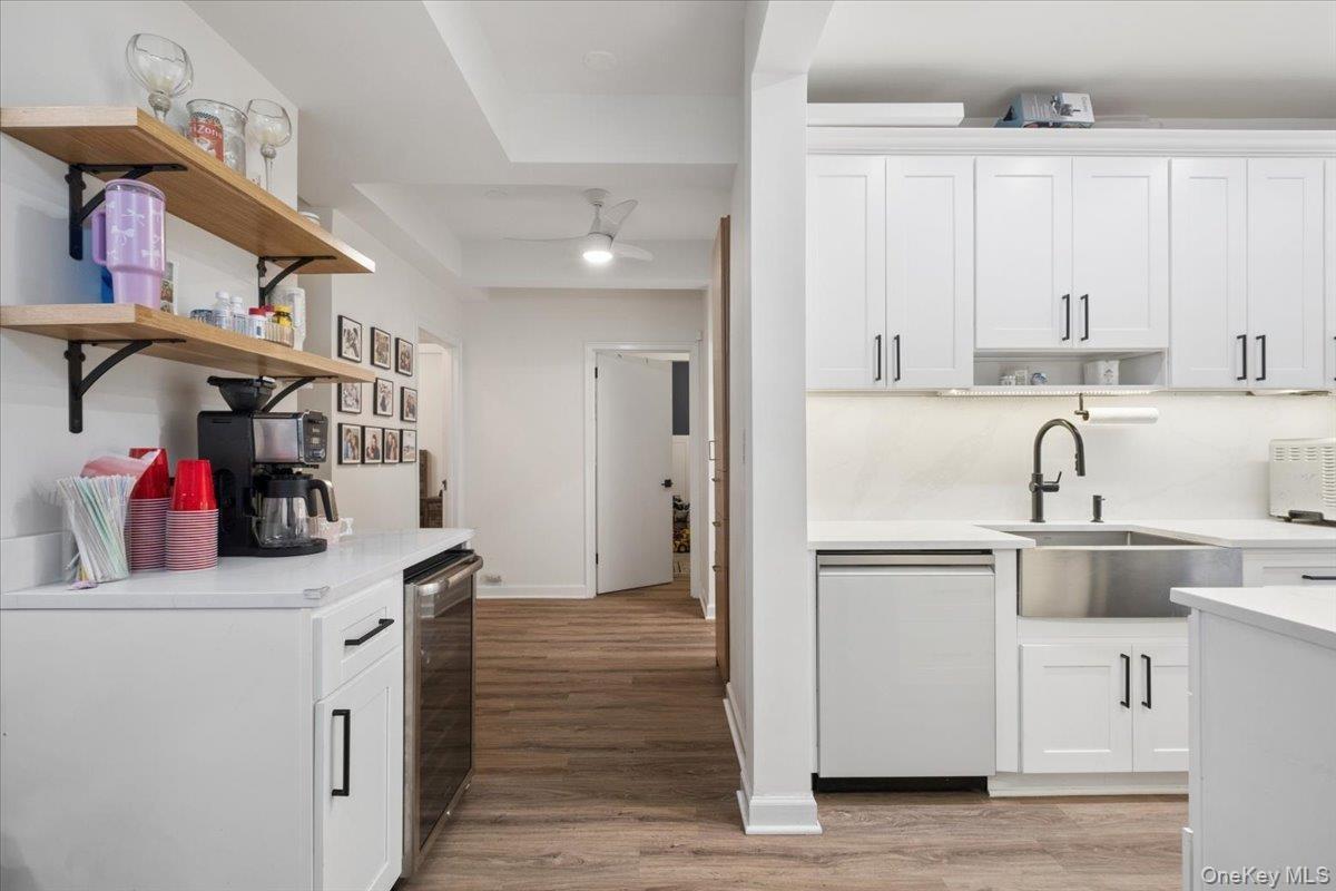 Beverage Center is on the left w/ Open Shelves and Built-in Wine Fridge