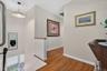 Sunlit second story hallway. Stair Chair Lift removed for photo