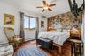 Primary bedroom w/hand-painted flower motif