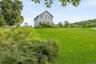 Barn-styled architecture, 3 Bedrooms, 2 full baths w/1250 septic (can be legal 4 bedroom).