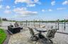 2nd Patio at rear of property by water