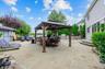 Rear Large Patio w/ Outdoor Kitchen & Pavilion