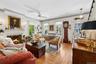 Living room with wood burning fireplace