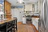 Eat in Kitchen with stainless steel appliances and gas stove