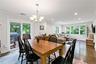 Dining Room with open layout to living room and sliding glass door to deck