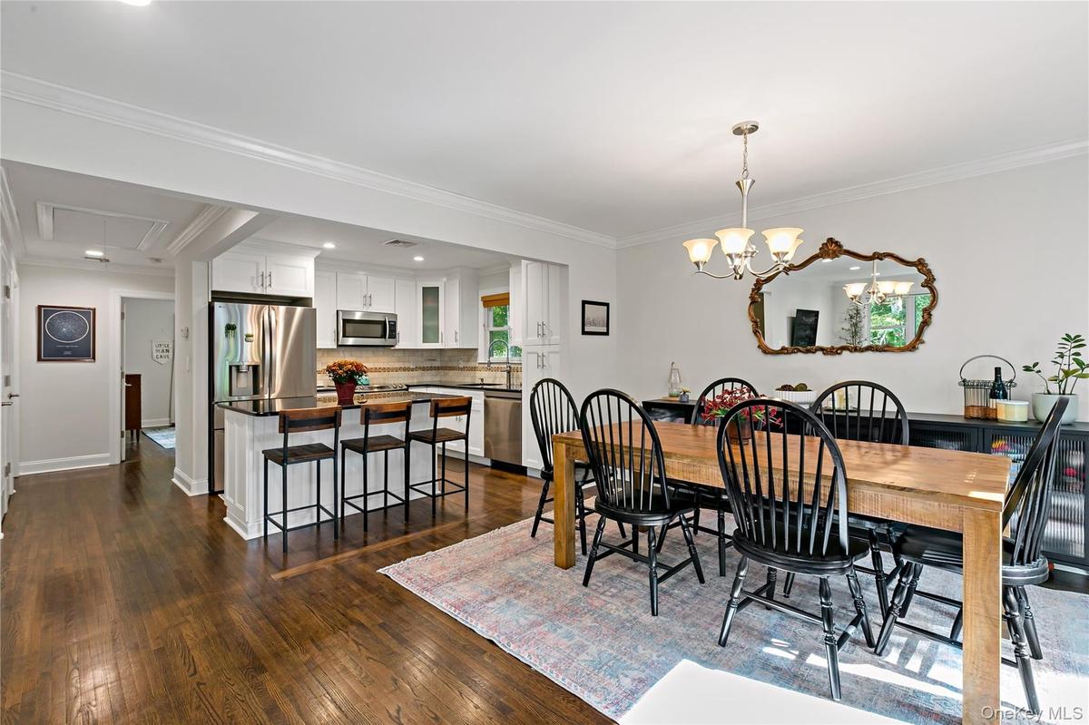 Dining room with open flow to kitchen
