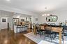 Dining room with open flow to kitchen