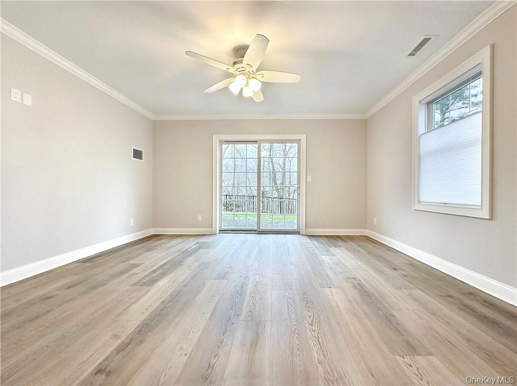Entry level family room with sliders to patio.