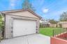 Detached garage with concrete driveway