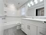 Full bathroom up a half flight from living space.