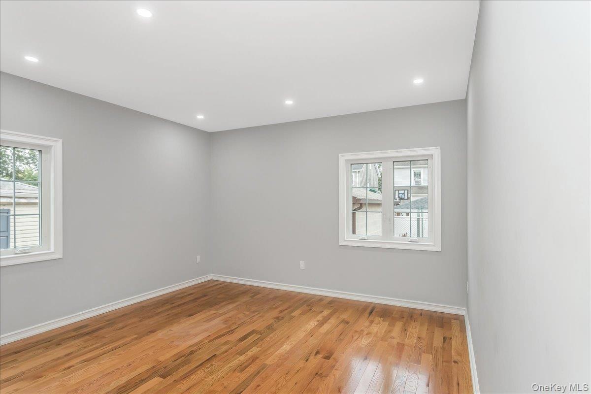 Unfurnished room featuring light wood-type flooring and recessed lighting