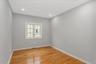Empty room featuring light wood-style floors and recessed lighting