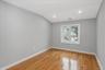 Unfurnished room featuring light wood-type flooring, recessed lighting, and vaulted ceiling