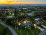 This Estate Home has a large home, paradise backyard and a large warehouse for all the toys.