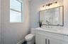 Powder bath, access from pool deck and the kitchen
