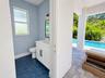 Powder bath, access from pool deck and the kitchen