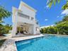 Heated saltwater pool, with a covered patio and outdoor kitchen