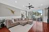Living Room with with magnificent views of the pool and Lake Carlton