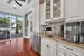 Kitchen with stunning views of the pool and Lake Carlton