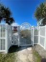 Private coded gate to Siesta Beach.