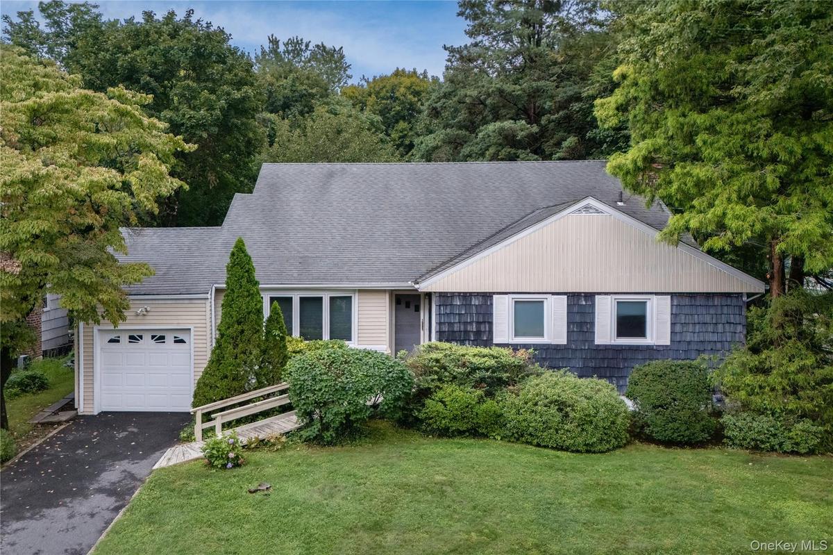 Welcome to Gedney Manor!  Despite its outward appearance as a modest ranch, this home is surprisingly spacious, adaptable,  and comfortable!
