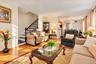 Living room, dining room and kitchen basking in sunlight