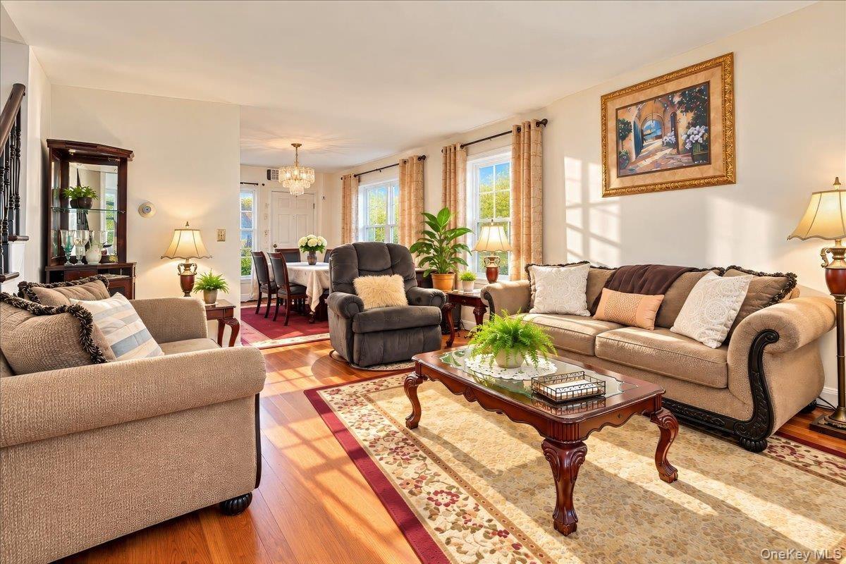 Bright and airy open living room and dining room.