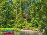 A private pathway leads directly to the the East Branch Croton River’s edge, where peaceful moments by the water or a leisurely kayak down the river a