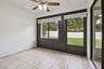 Lanai with access to primary bedroom and living room