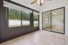 Lanai with access to primary bedroom and living room