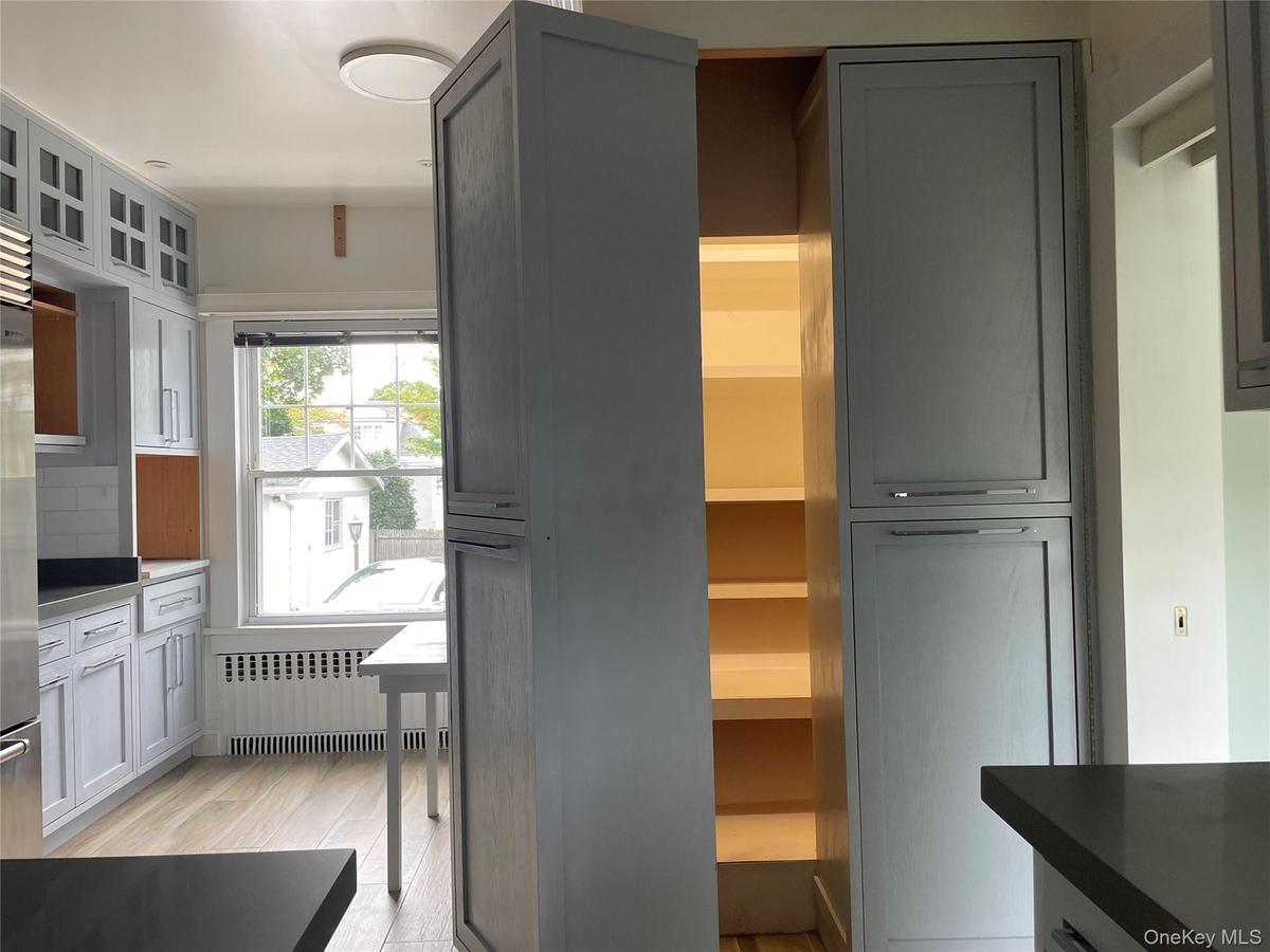 Hidden pantry in Kitchen