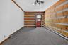 Residence #2 - second bedroom.  Access to courtyard and garage.  Petite full bathroom.  Generous closet.
