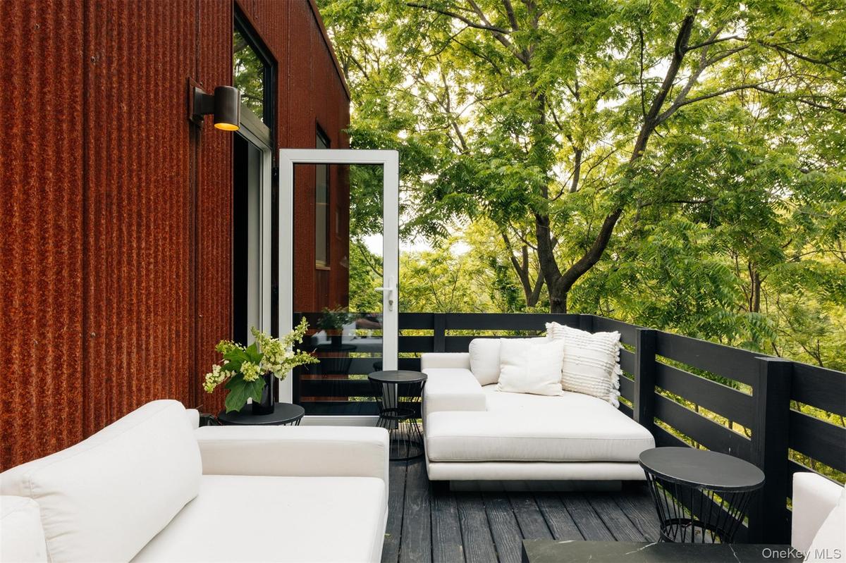 Wooden deck with outdoor lounge area