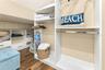 Walk-In Closet with Custom Shelving