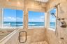 Glass-Enclosed Shower with Ocean Views