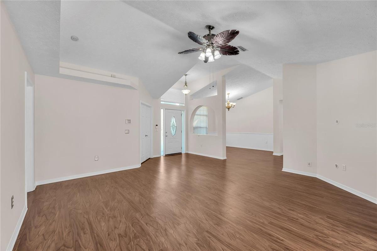 Vaulted ceilings make this living/dining room combination feel open and spacious.