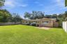 A view of the backyard and rear of the home.