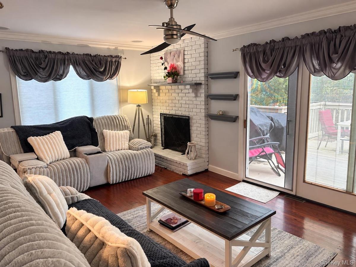 With fireplace and access to deck